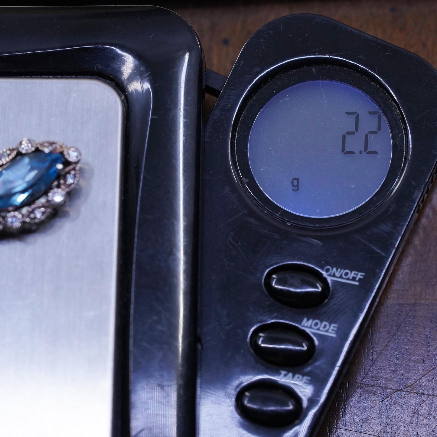Vintage Sterling 925 silver handmade pendant with blue topaz and cz around