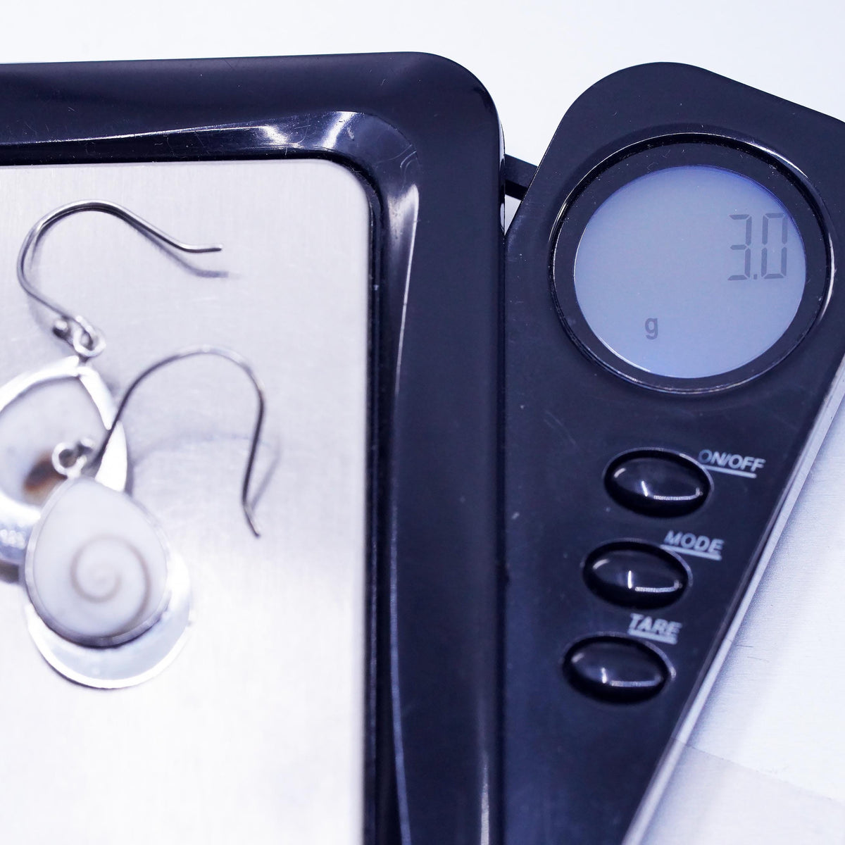 Sterling 925 Silver Shiva eye teardrop earrings | Mexican Jewelry, fossil shell