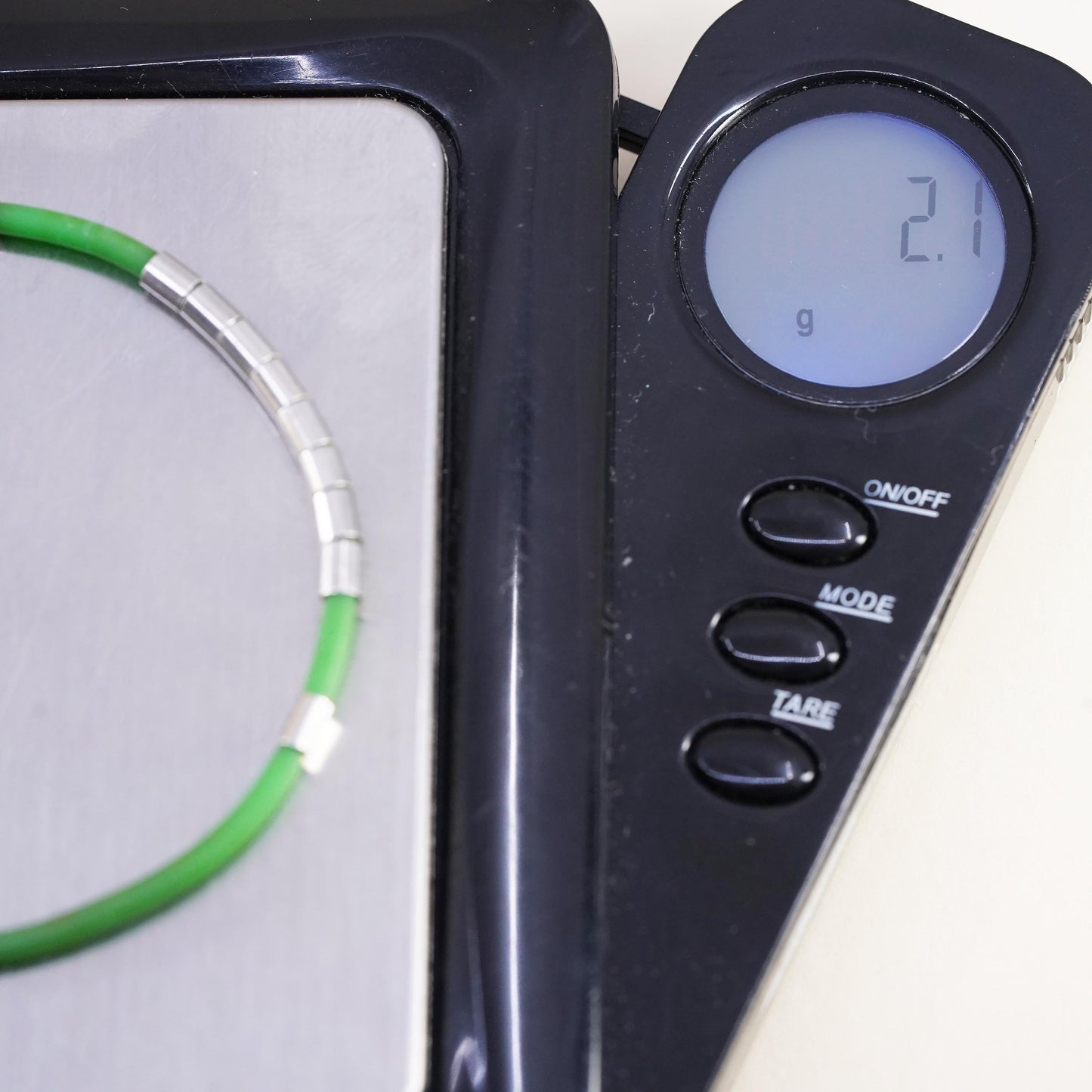 6”, Vintage green rubber band stackable bracelet with silver tone details