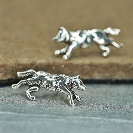 Vintage southwestern Sterling 925 silver handmade star earrings, wolf studs