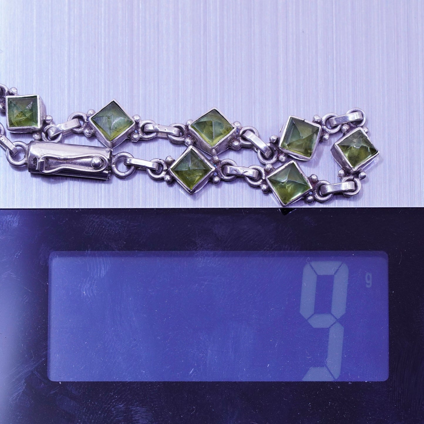 7.25”, Vintage Sterling 925 silver handmade bracelet with diamond cut peridot