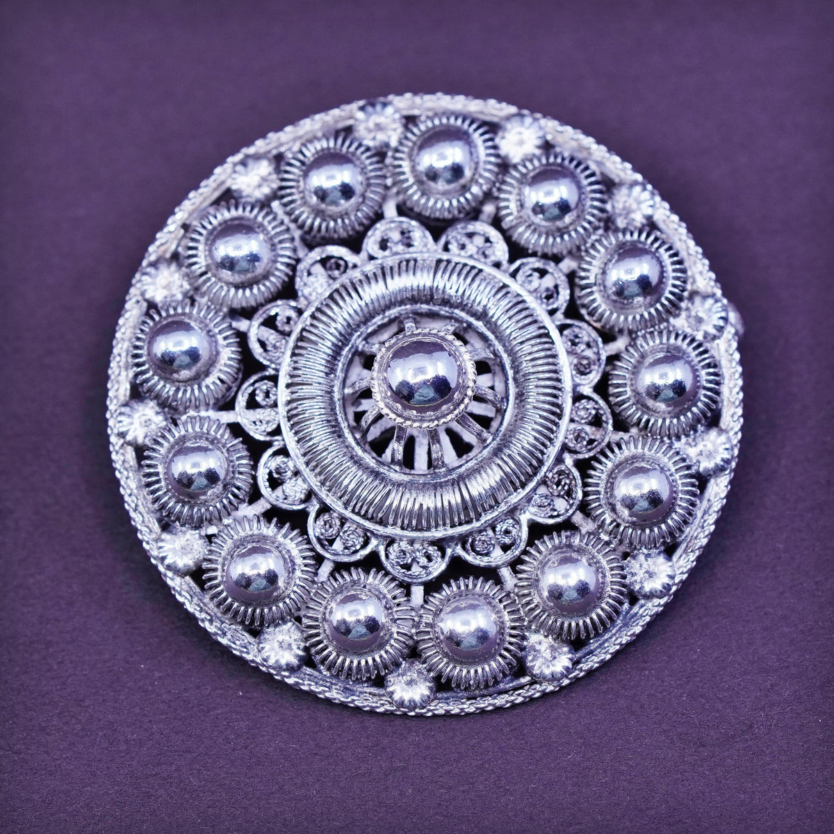 Vintage handmade sterling silver round shaped filigree bead brooch