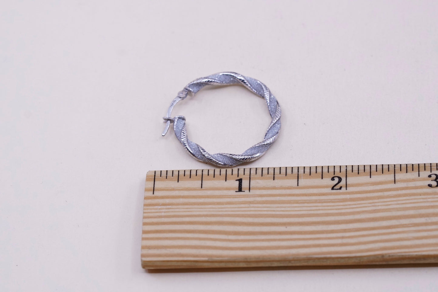 1.25”, sterling silver handmade earrings, 925 huggie, twisted glittering hoops