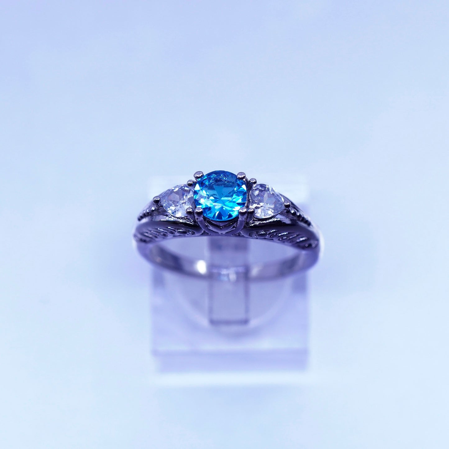 Size 7.75, vintage Sterling 925 silver handmade filigree ring with blue Cz