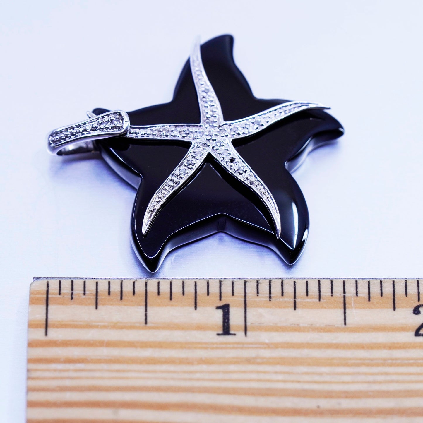 Antique Sterling 925 silver 925 starfish with obsidian and cluster cz