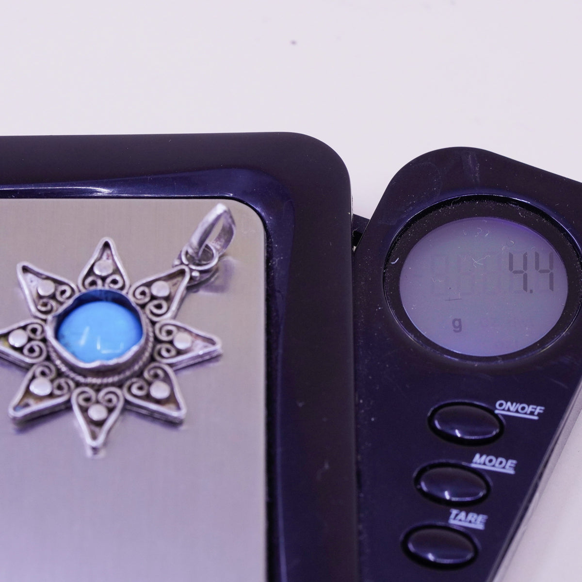 Vintage Sterling 925 silver handmade sun pendant with turquoise