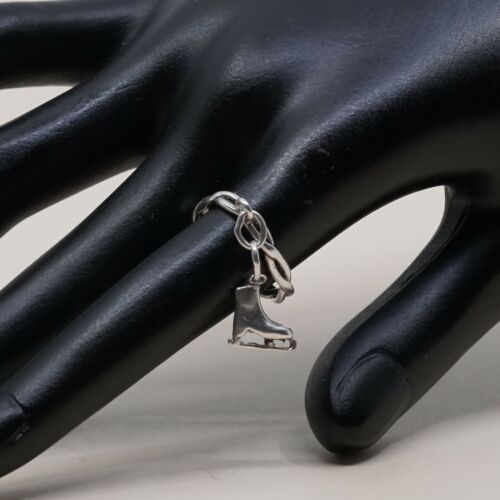 Size 4, Vtg Sterling Silver handmade Ring. 925 Entwined band W/ Skating Shoe