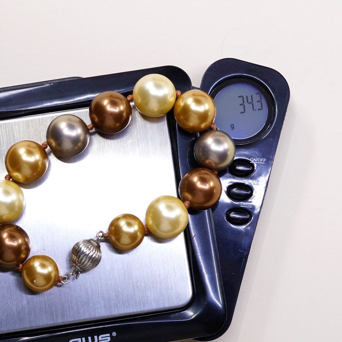 6.5”, Vintage handmade bracelet, gold and earth tone pearl beads w/ 925 clasp