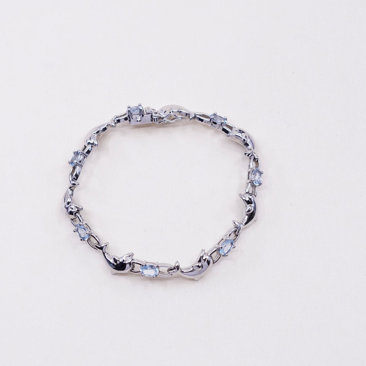 7.25”, vintage Sterling silver handmade bracelet, 925 dolphin links with topaz