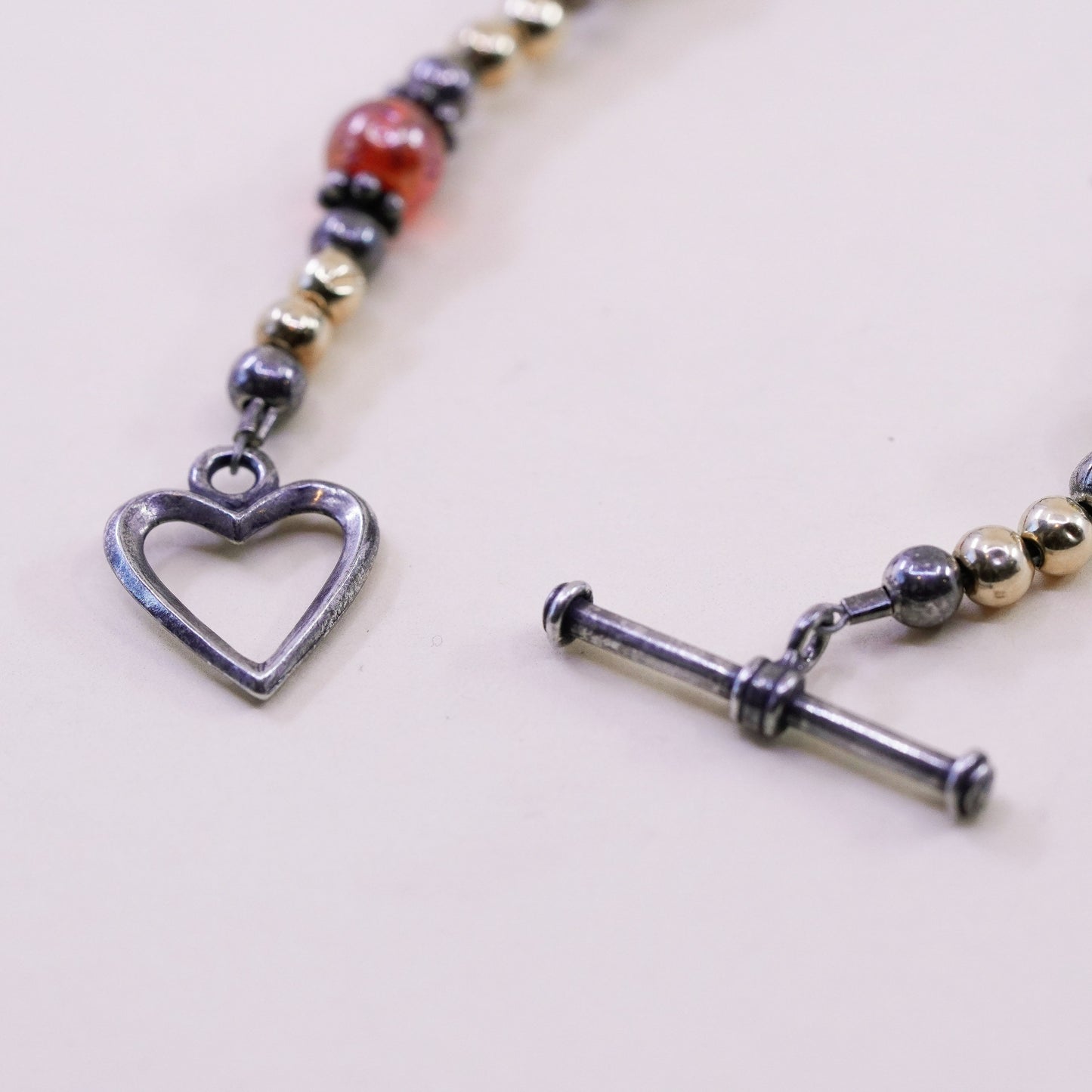 7”, Sterling 925 silver bracelet with 14K gold beads and heart toggle closure