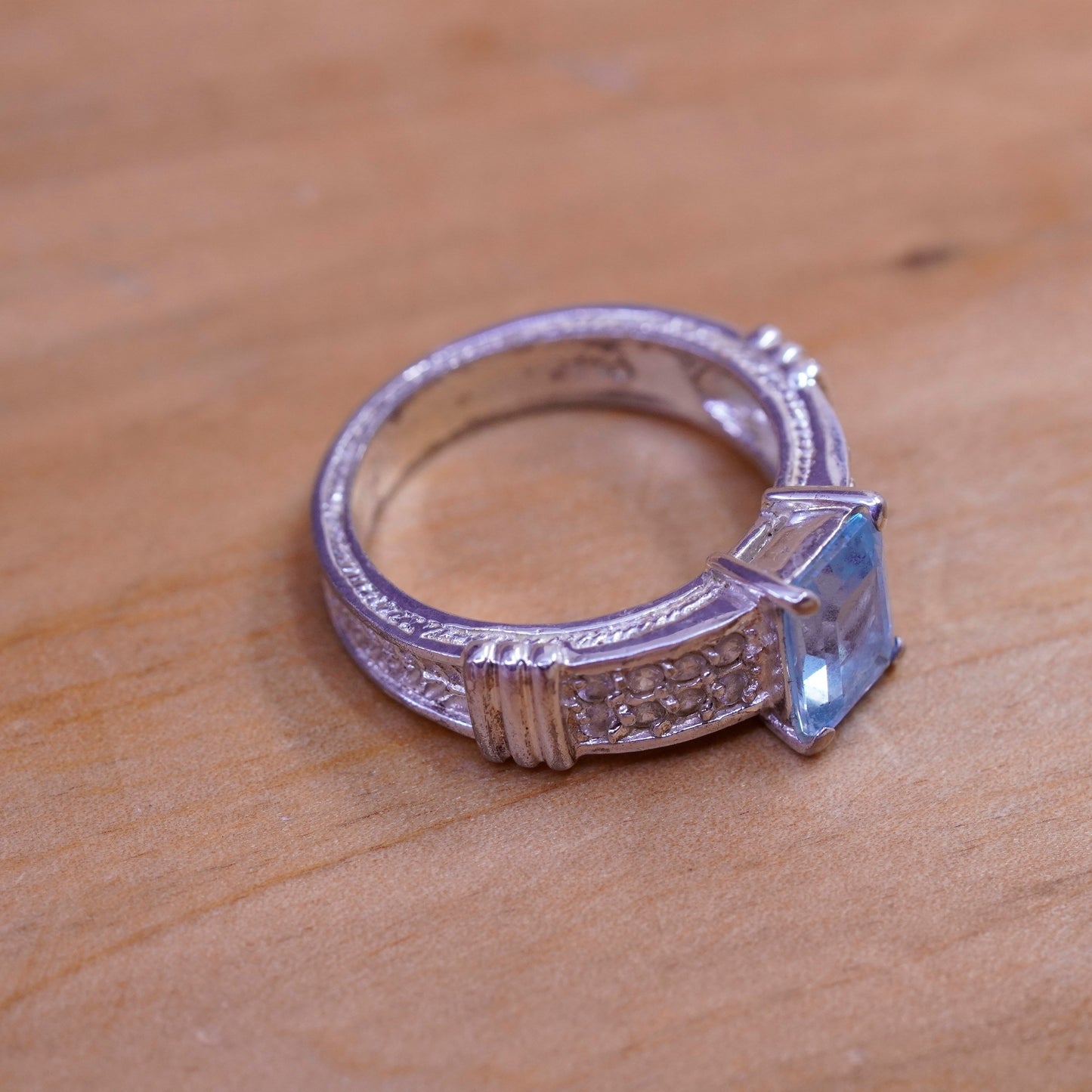 Size 8.25, vintage Sterling 925 silver engagement ring with blue topaz and cz