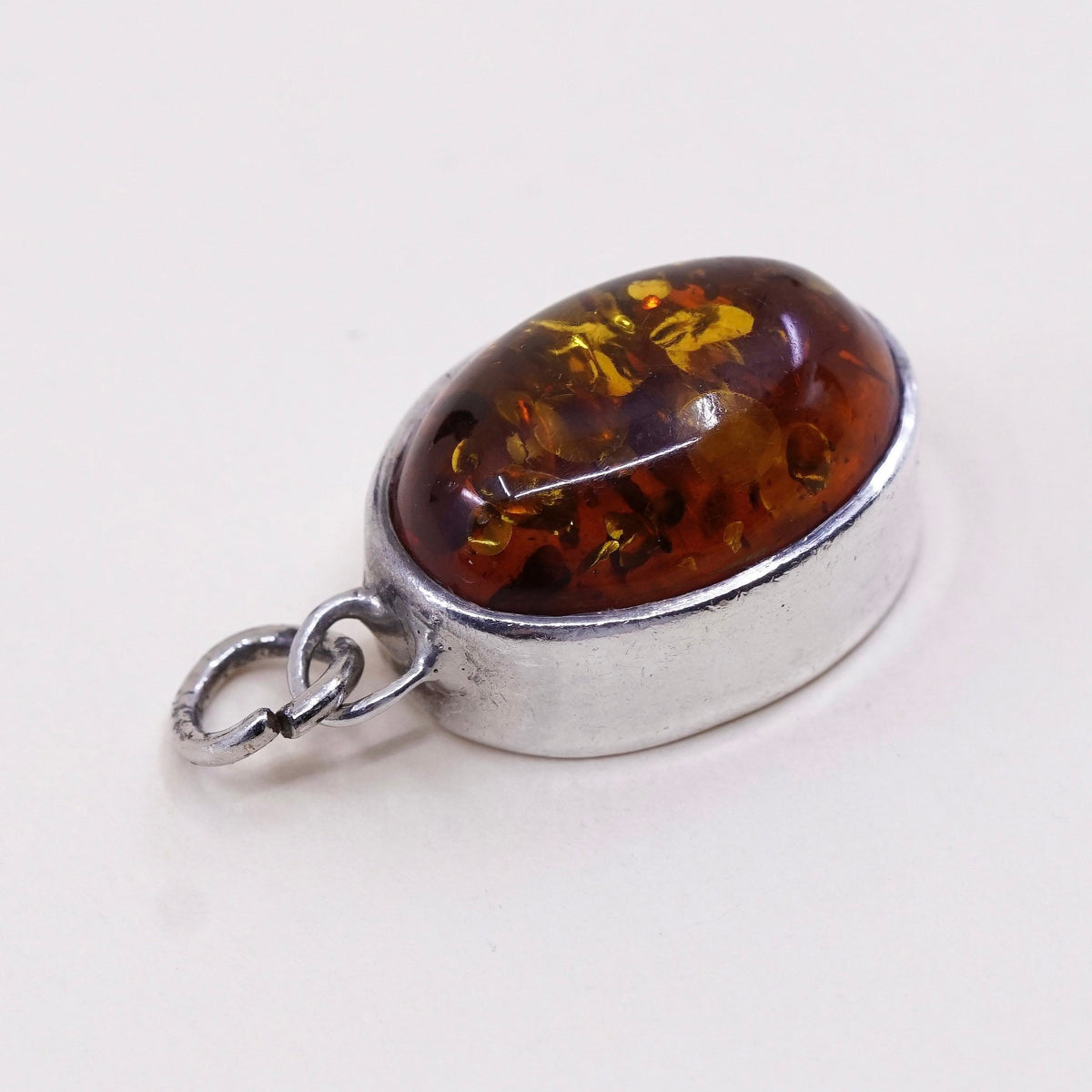 Vintage Lori Bonn sterling 925 silver handmade pendant with oval amber