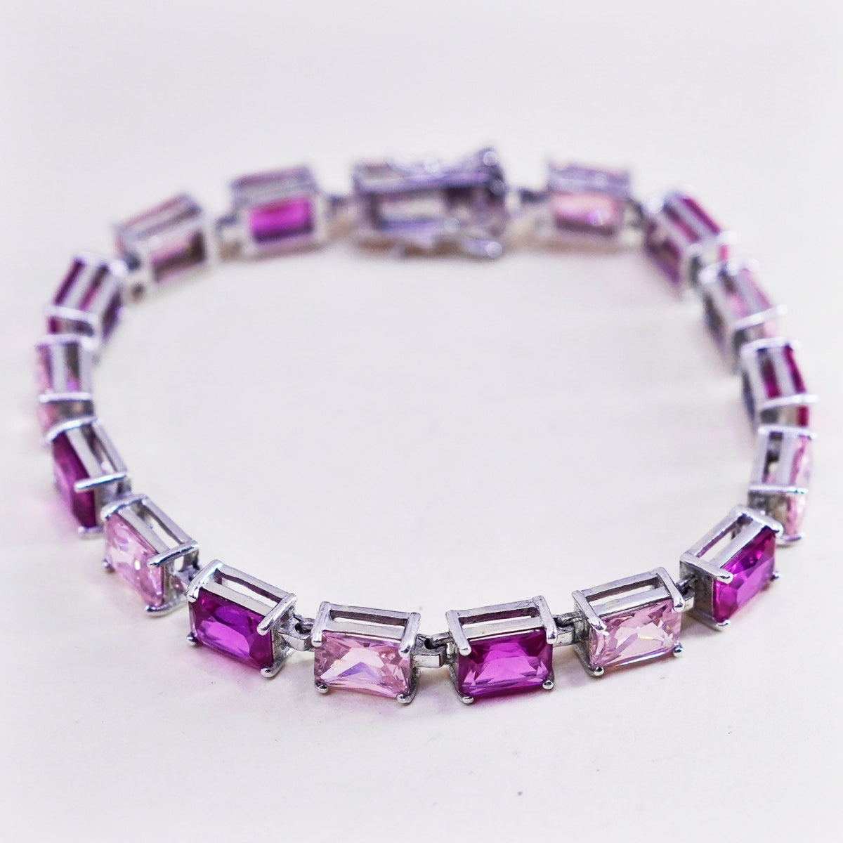 7.25”, vtg Sterling silver fashionable tennis bracelet, 925 chain pink crystal
