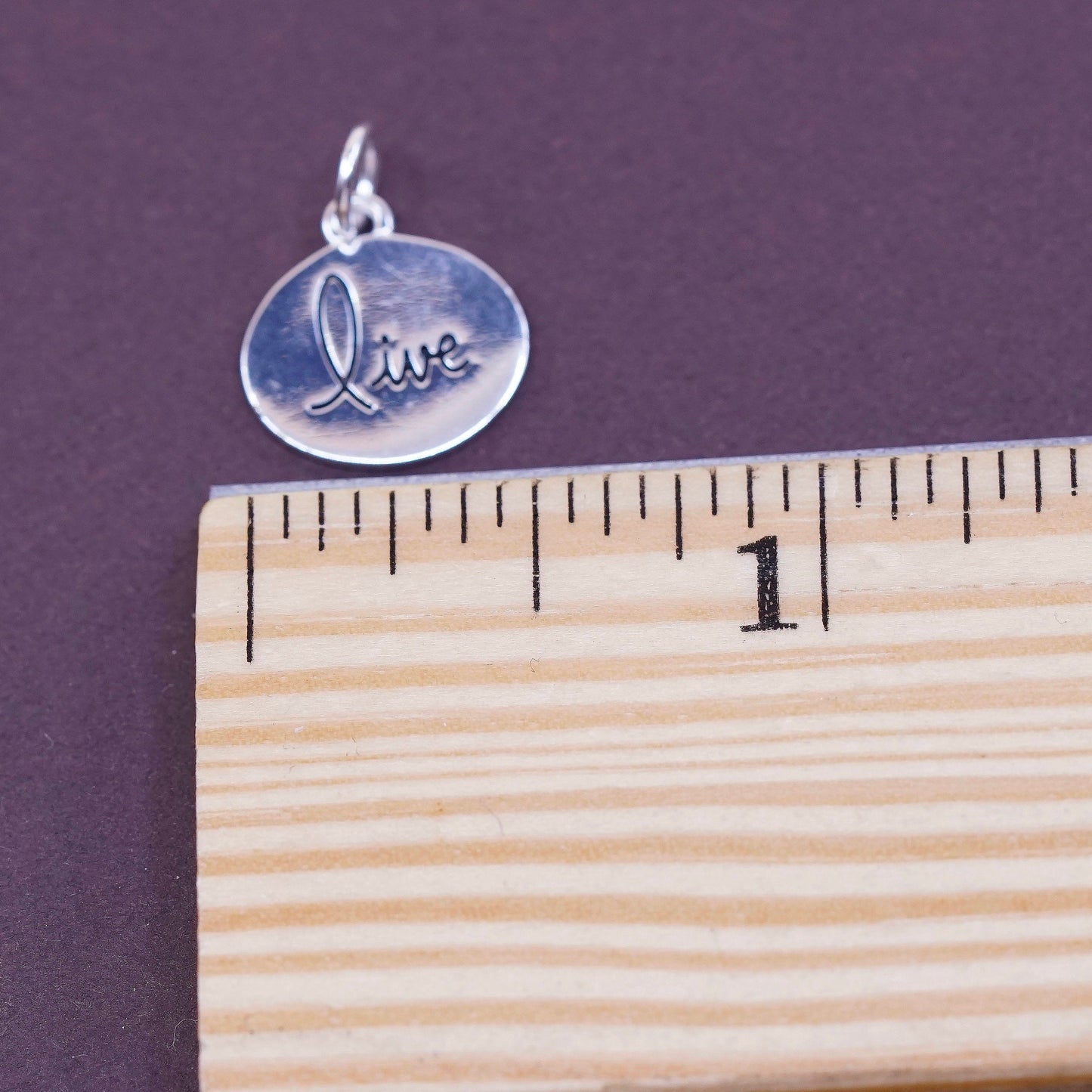 vtg Sterling silver handmade charm, 925 tag pendant embossed “live”