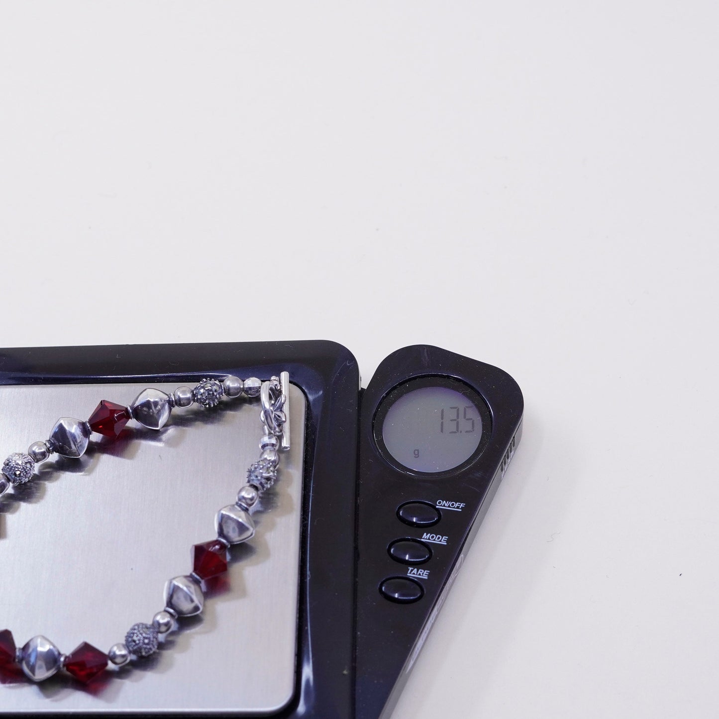 6.75”, handmade bracelet, ruby with sterling 925 silver beads N toggle closure