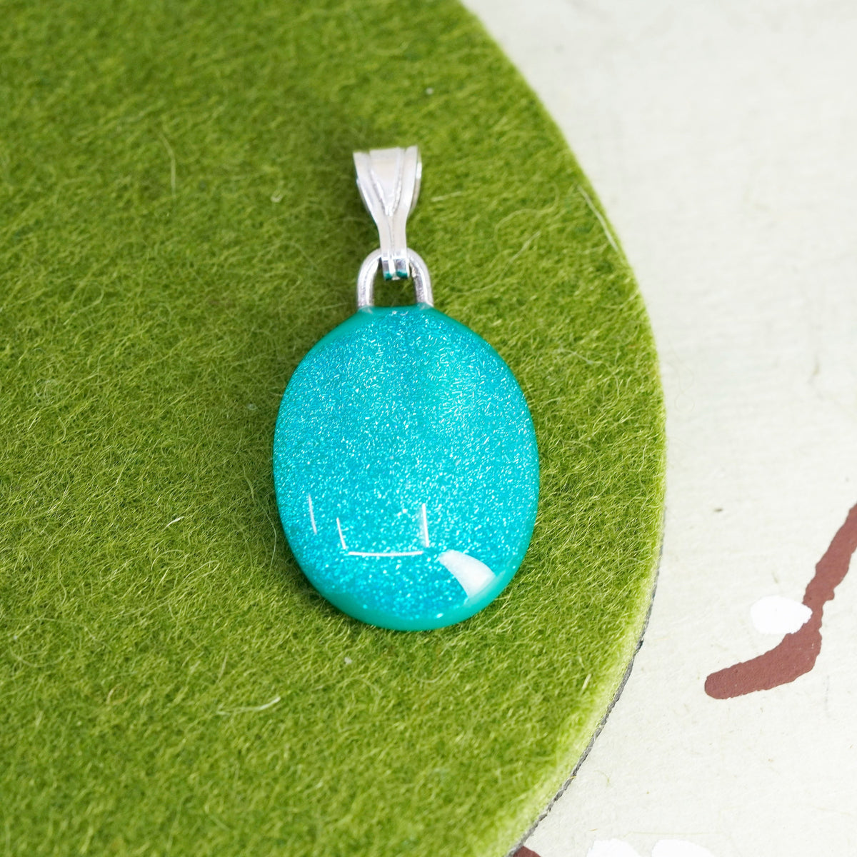 Vintage sterling silver with artisan glass pendant, oval teal dichroic glass