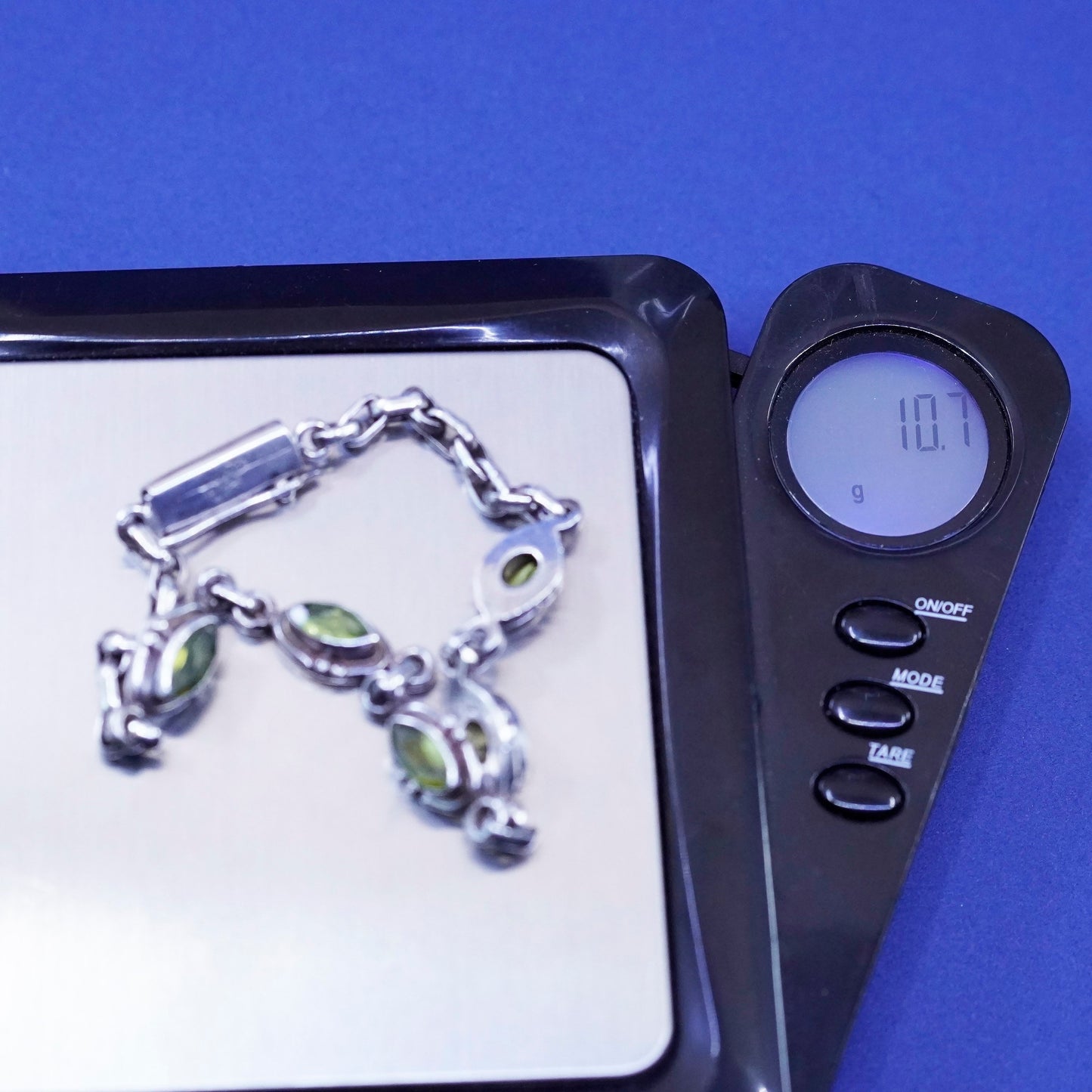 7”, vintage Sterling 925 silver tennis bracelet with marquise shaped peridot