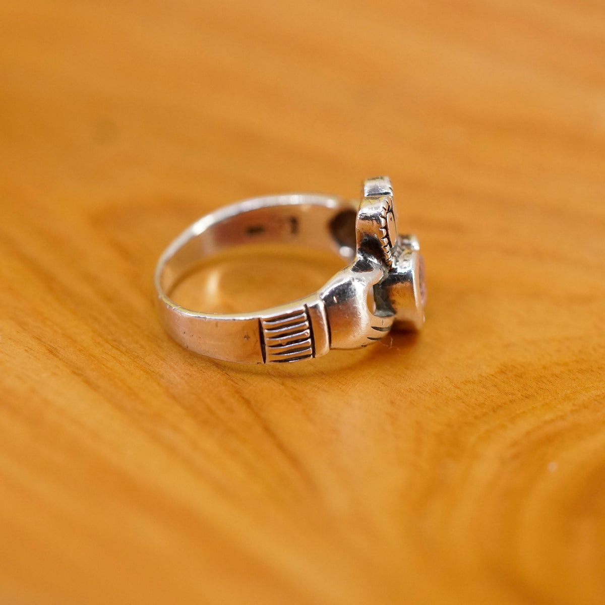 Size 7, Vintage sterling 925 silver claddagh ring, holding pink Cz heart band