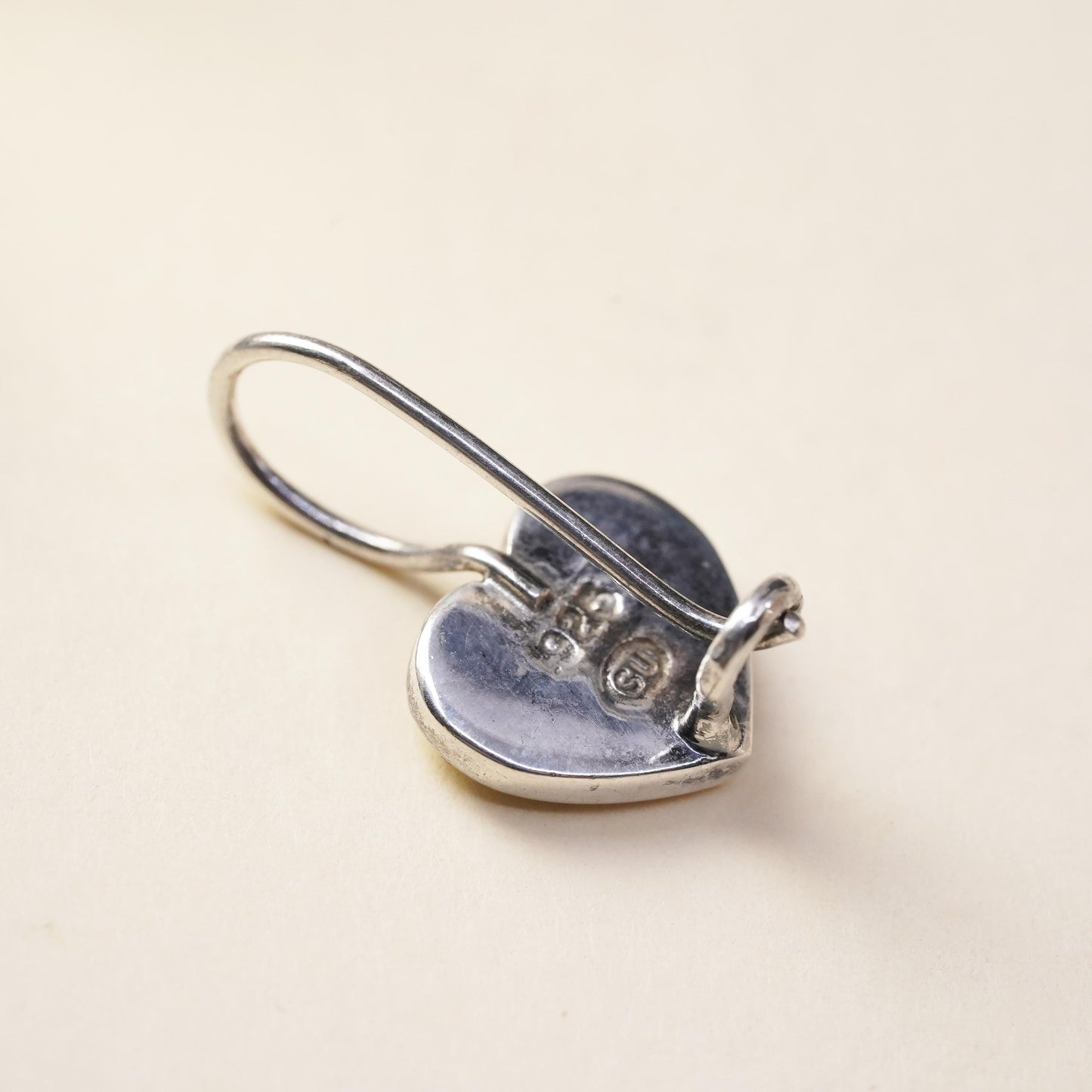 Vintage handmade single earring. Sterling 925 silver heart with onyx inlay