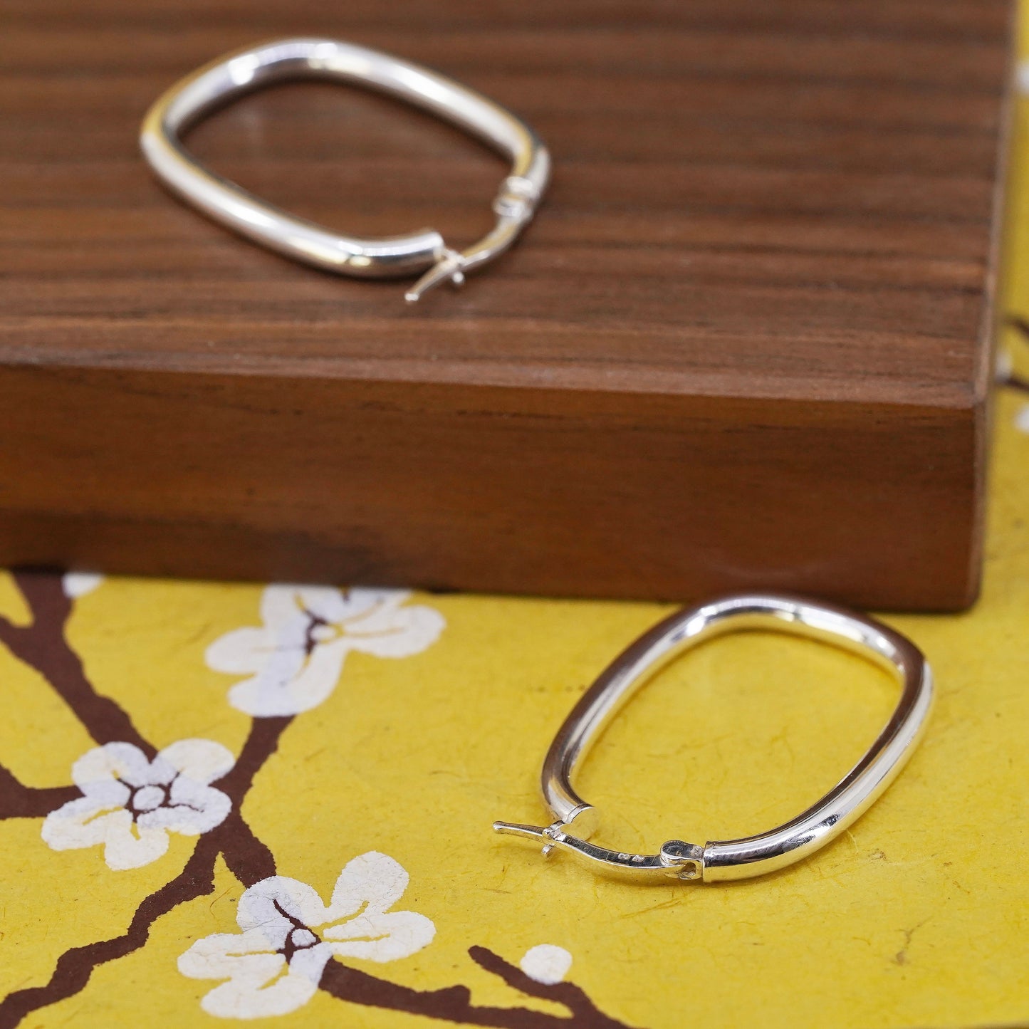 1.25", Sterling silver oval hoop earrings, textured 925 huggie
