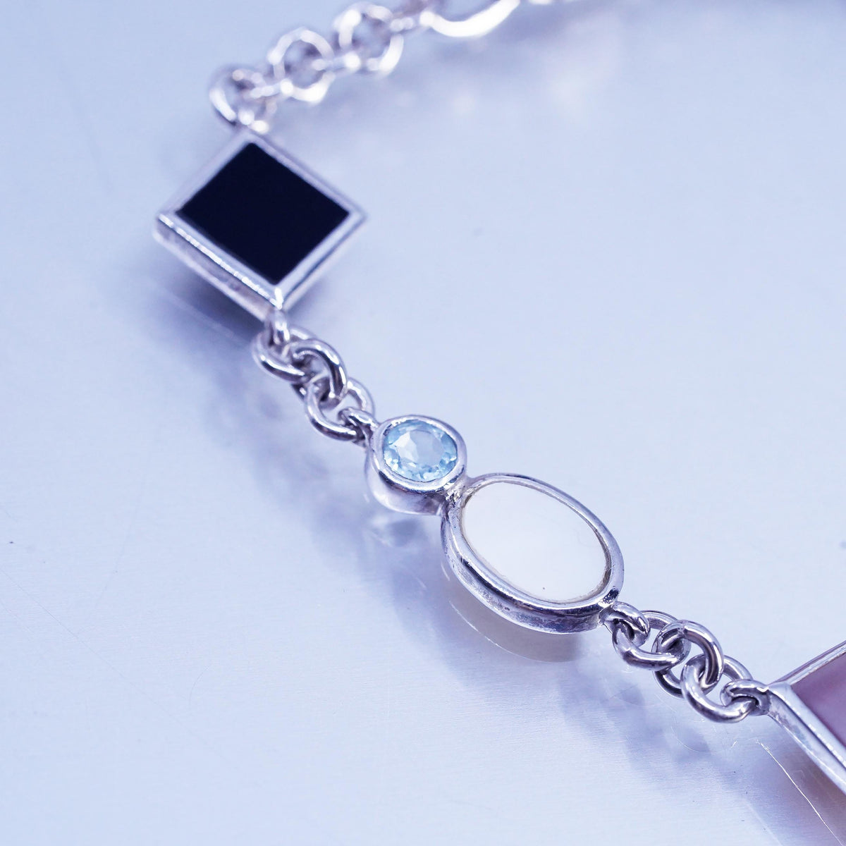 7.5”, sterling 925 silver inlay bracelet black onyx topaz pink mother of pearl