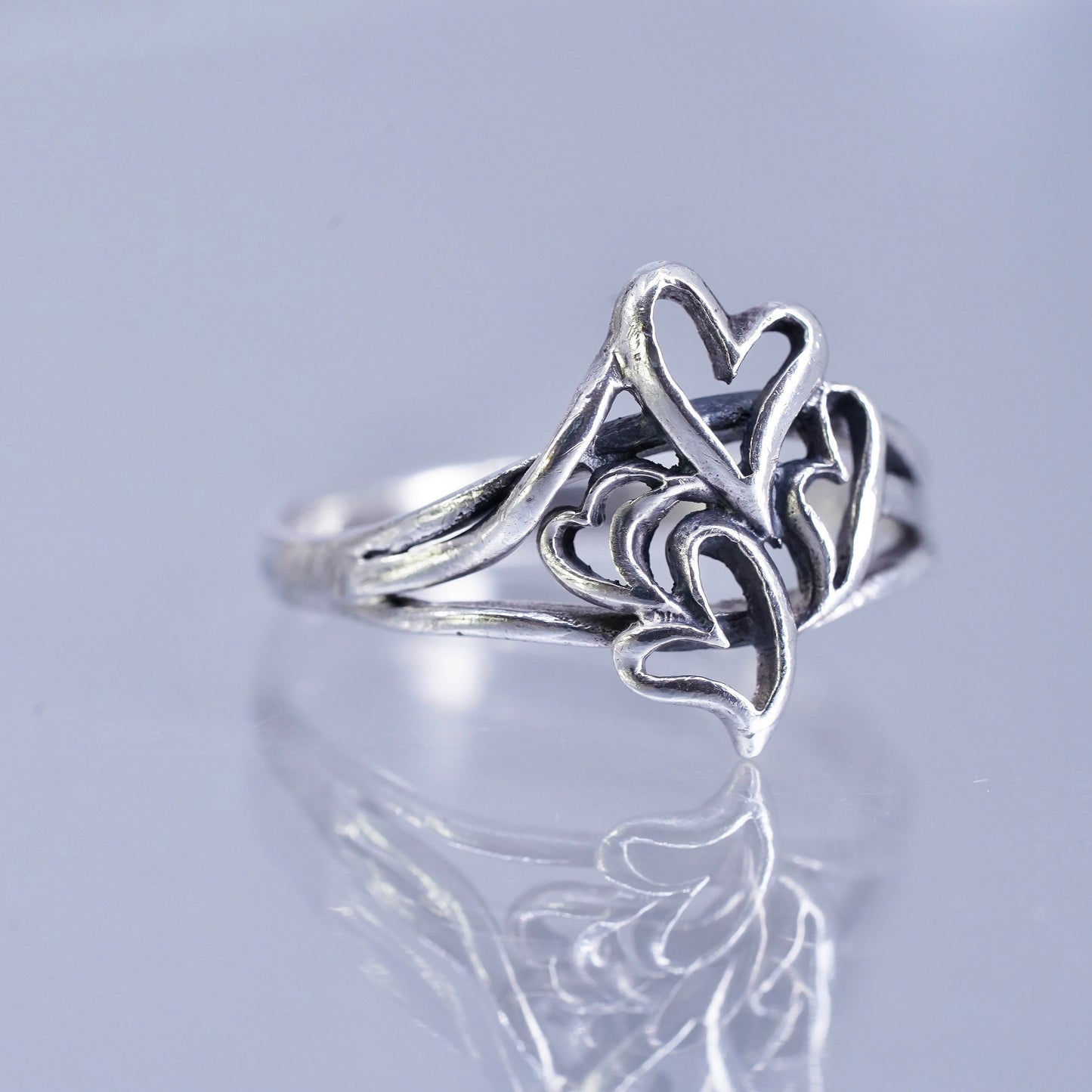 Size 7.5, southwestern Sterling 925 silver wedding ring, heart stackable band