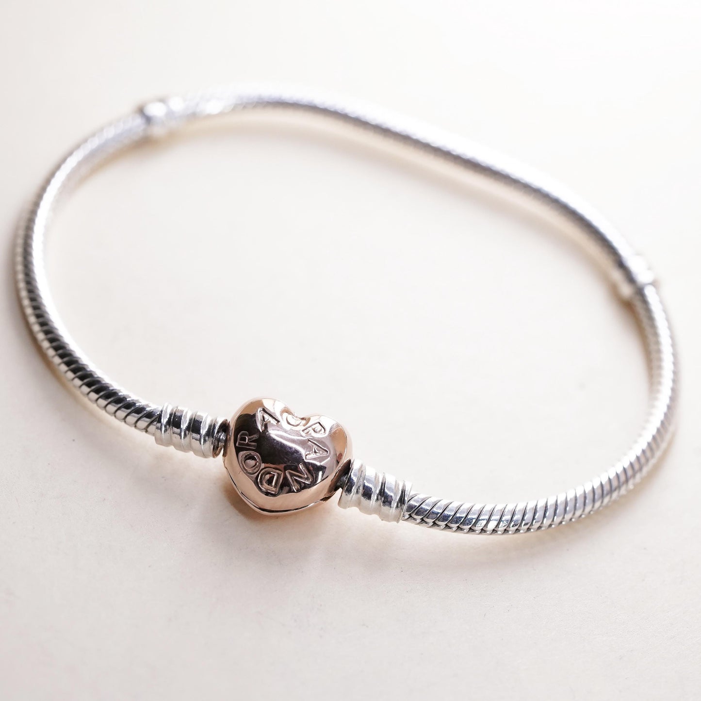 6.75” Pandora two tone sterling silver bracelet, 925 snake rose gold heart