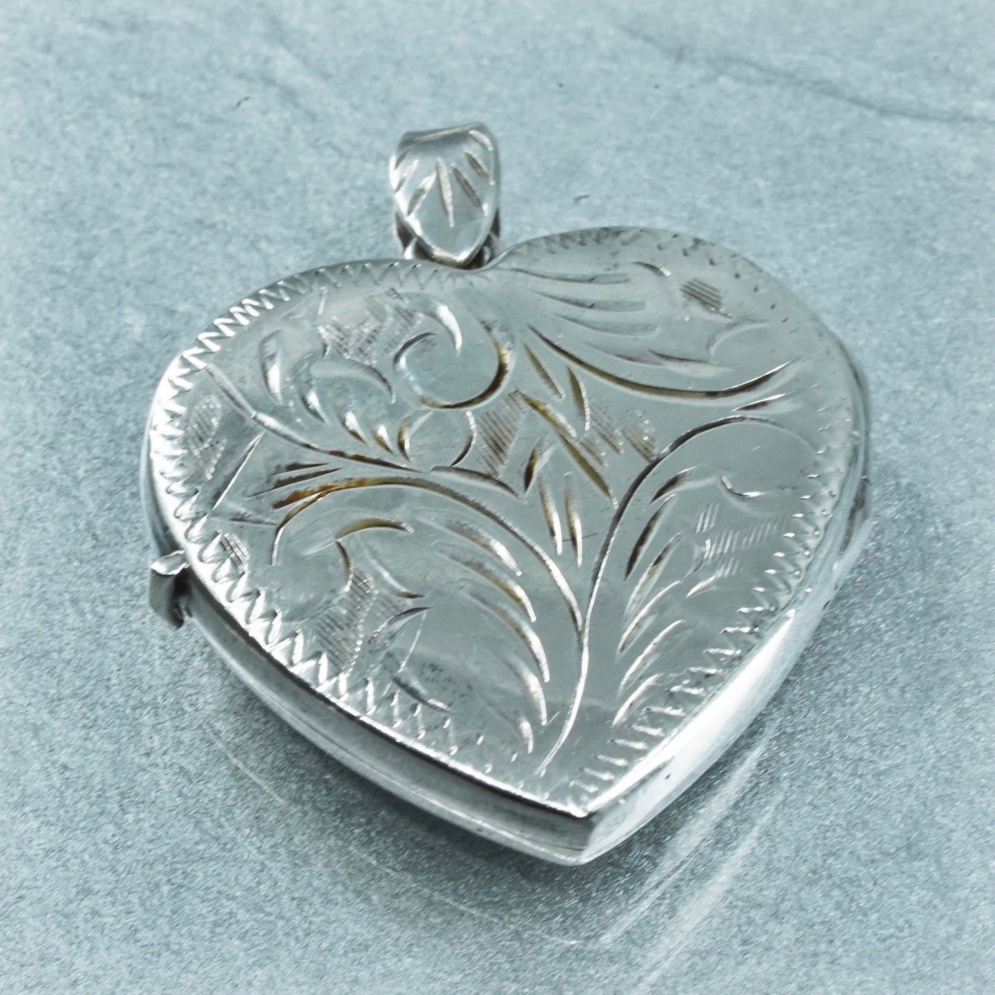Vintage Sterling silver handmade charm, textured 925 heart photos locket