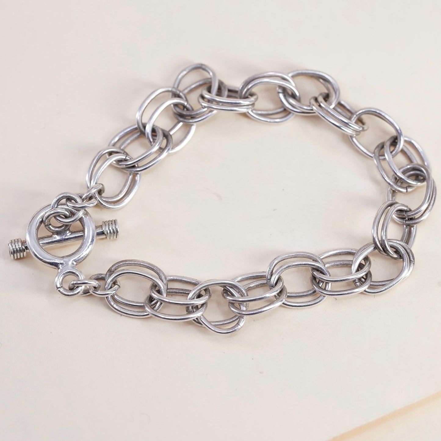 6.75", VTG sterling 925 silver textured circle charm bracelet toggle closure