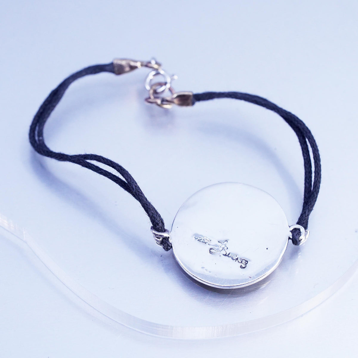 6.75", Signed two tone sterling 925 silver monogram "HDM" tag black bracelet