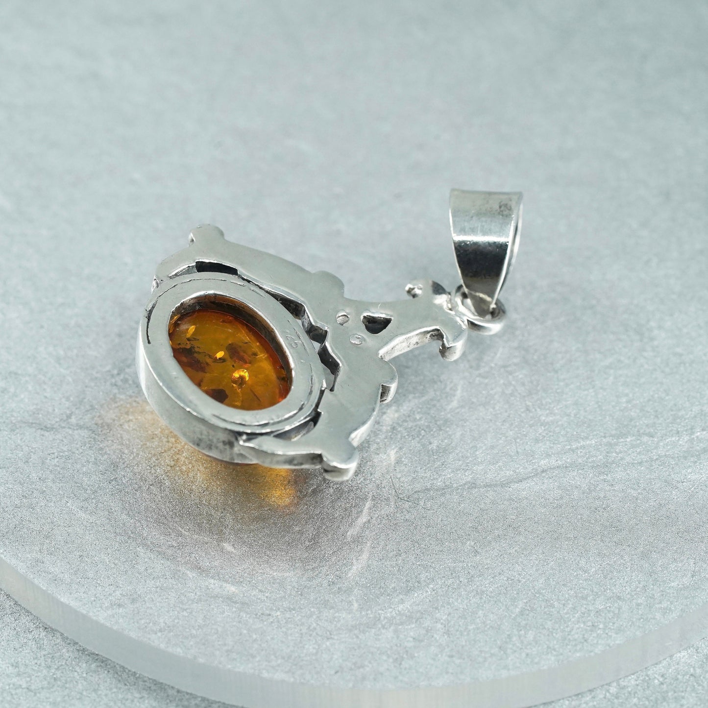 Vintage sterling 925 silver handmade pendant with oval amber
