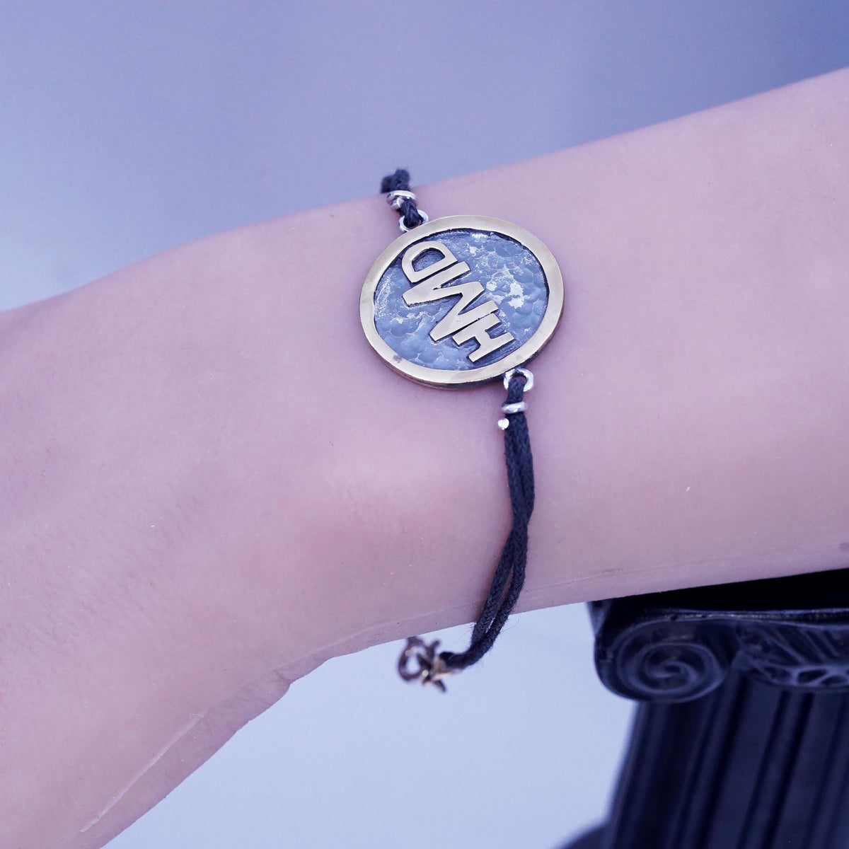 6.75", Signed two tone sterling 925 silver monogram "HDM" tag black bracelet