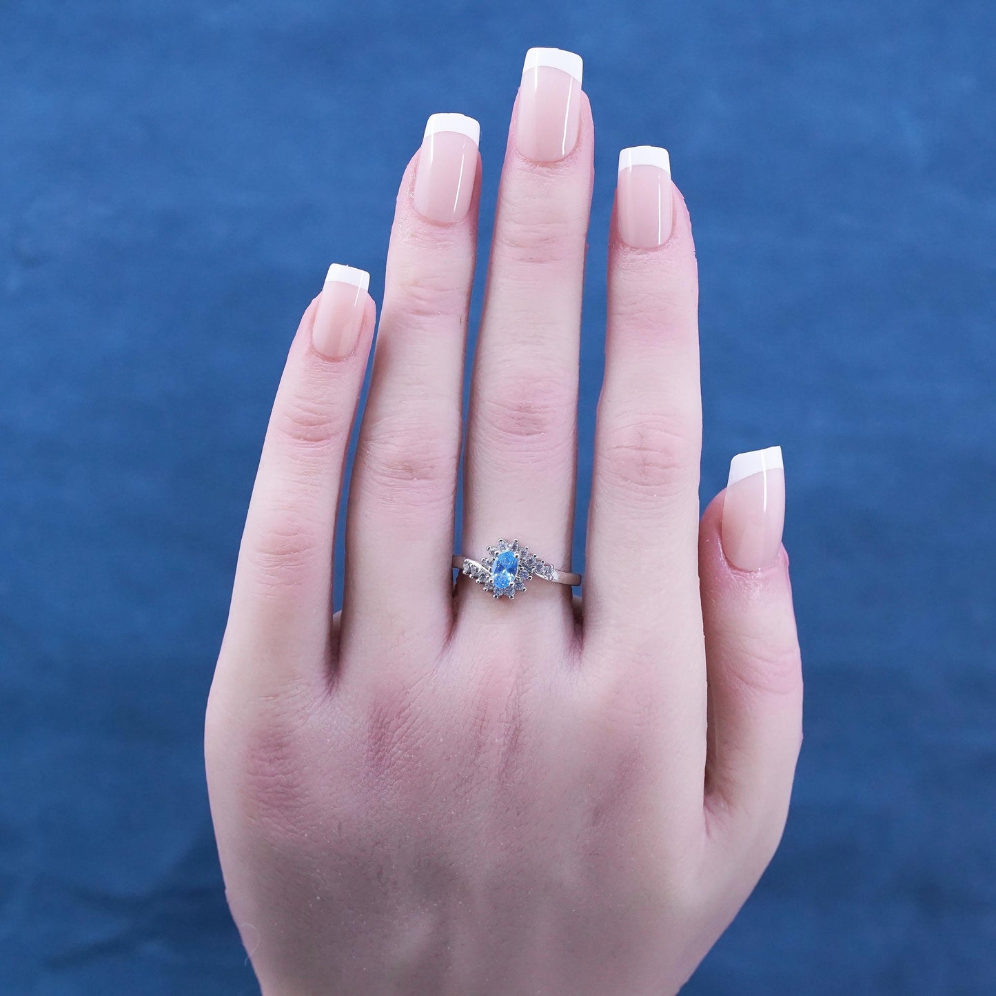 Size 7, vintage sterling 925 silver handmade ring with blue topaz and cz around