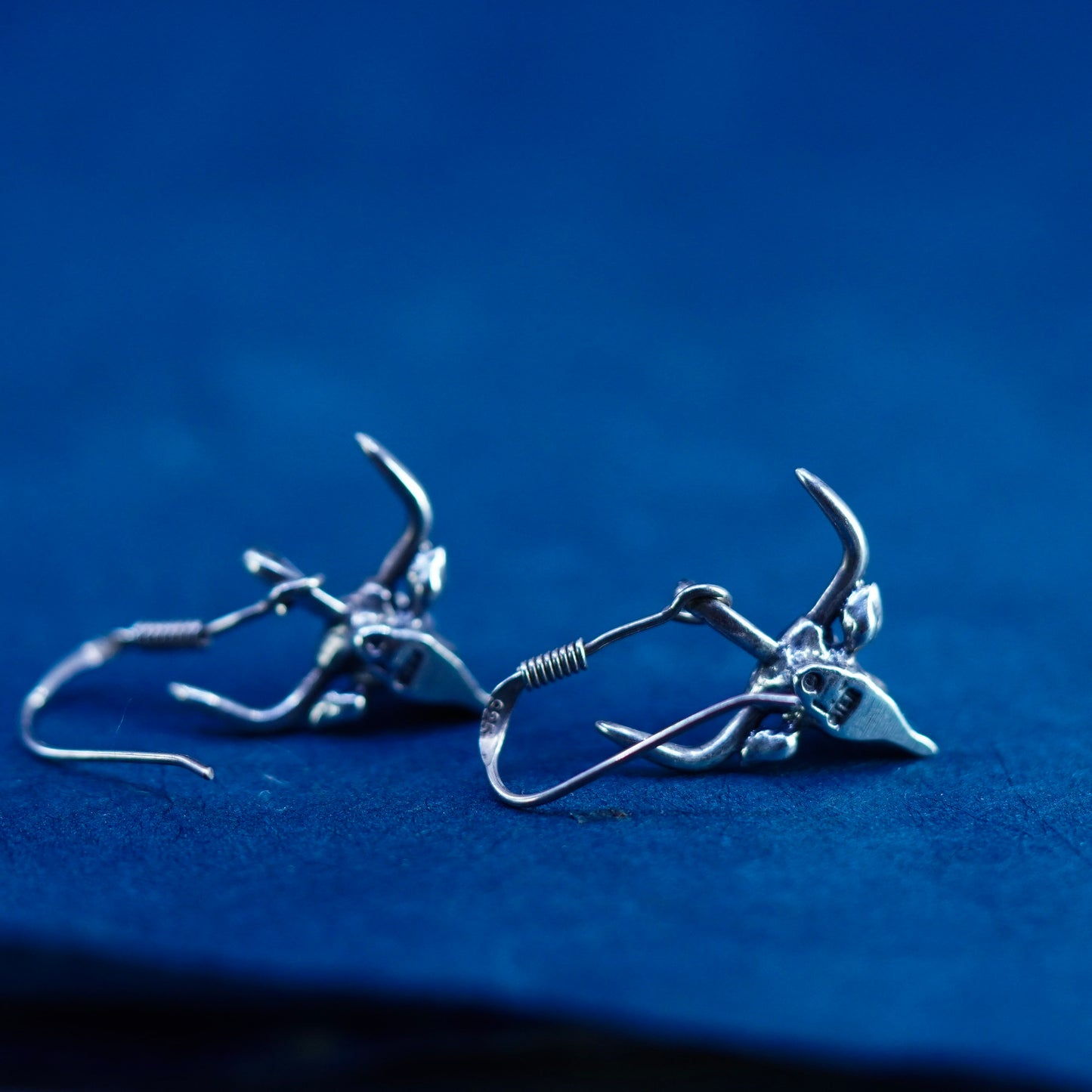 Vintage sterling silver handmade earrings with ox bull head