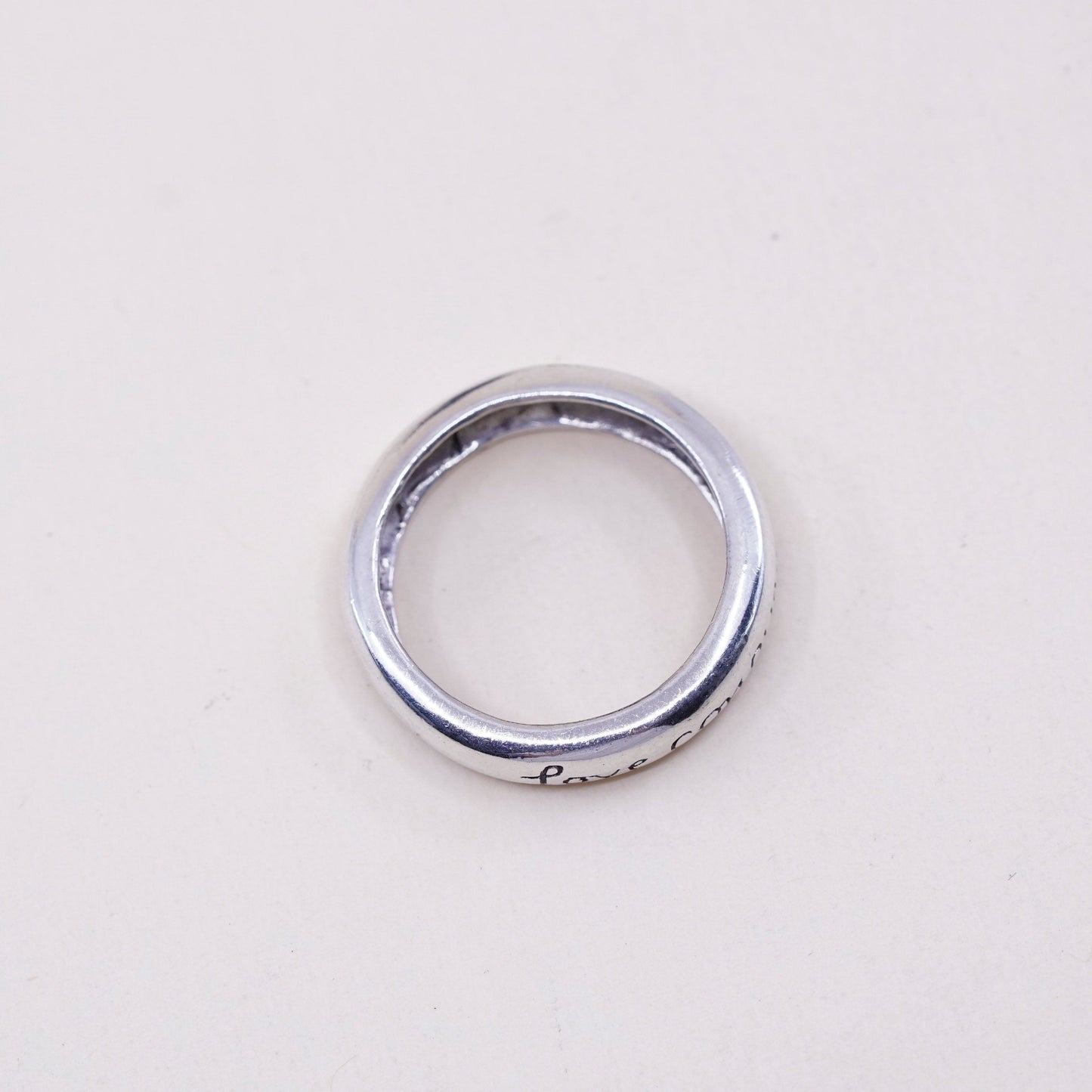 sz 7.75, vtg sterling silver handmade ring, 925 quote band “love conquers