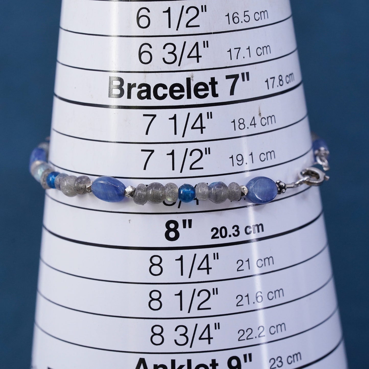7.75”, sterling silver bracelet with blue Swarovski crystal moonstone beads