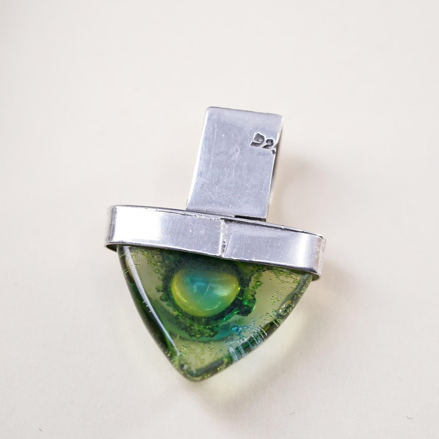 Vintage sterling silver with triangular green dichroic foiled glass pendant