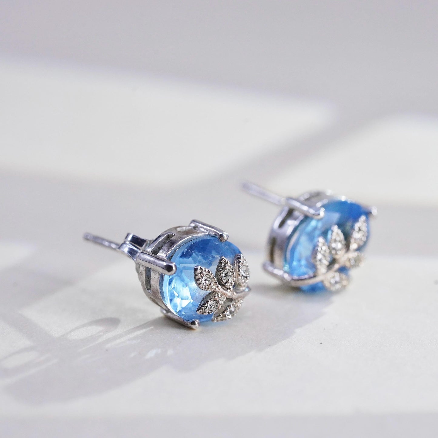 Vintage Sterling silver earrings, 925 studs with blue topaz and leaves