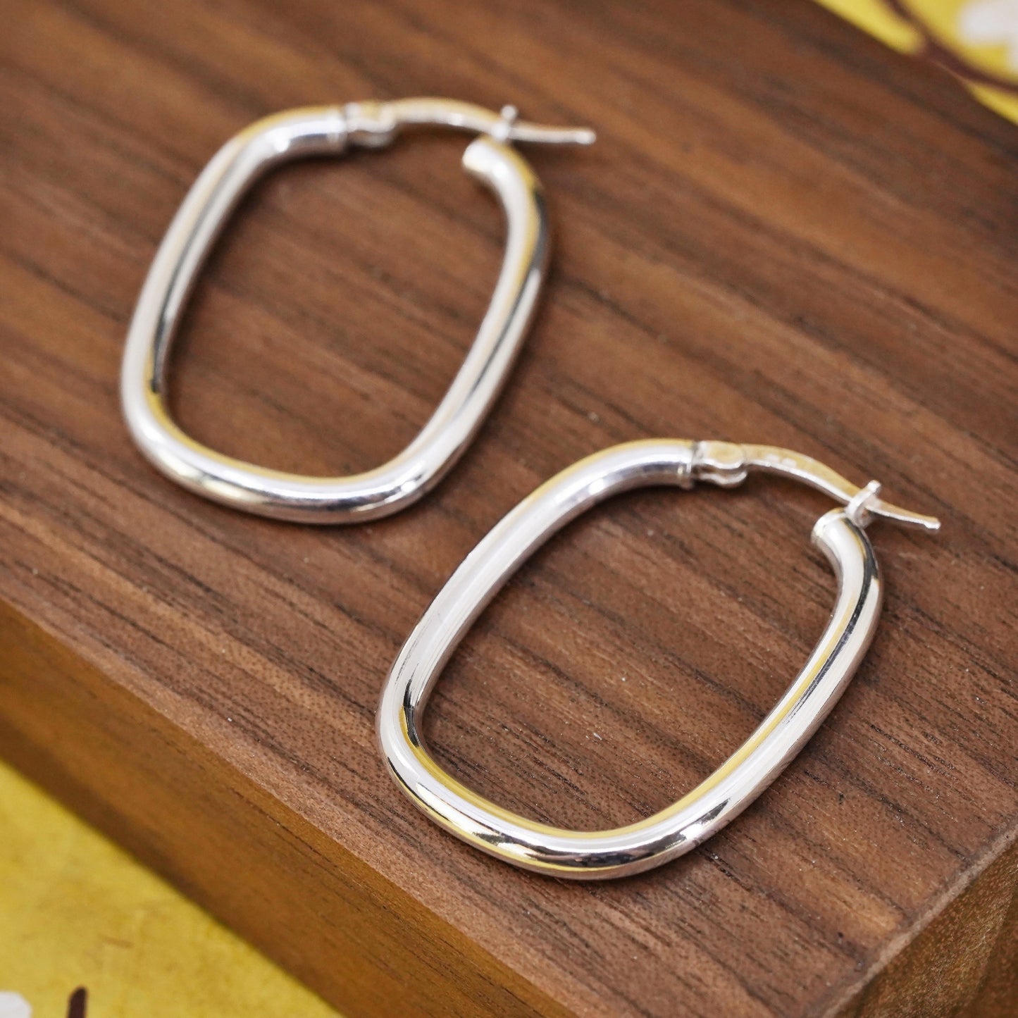 1.25", Sterling silver oval hoop earrings, textured 925 huggie