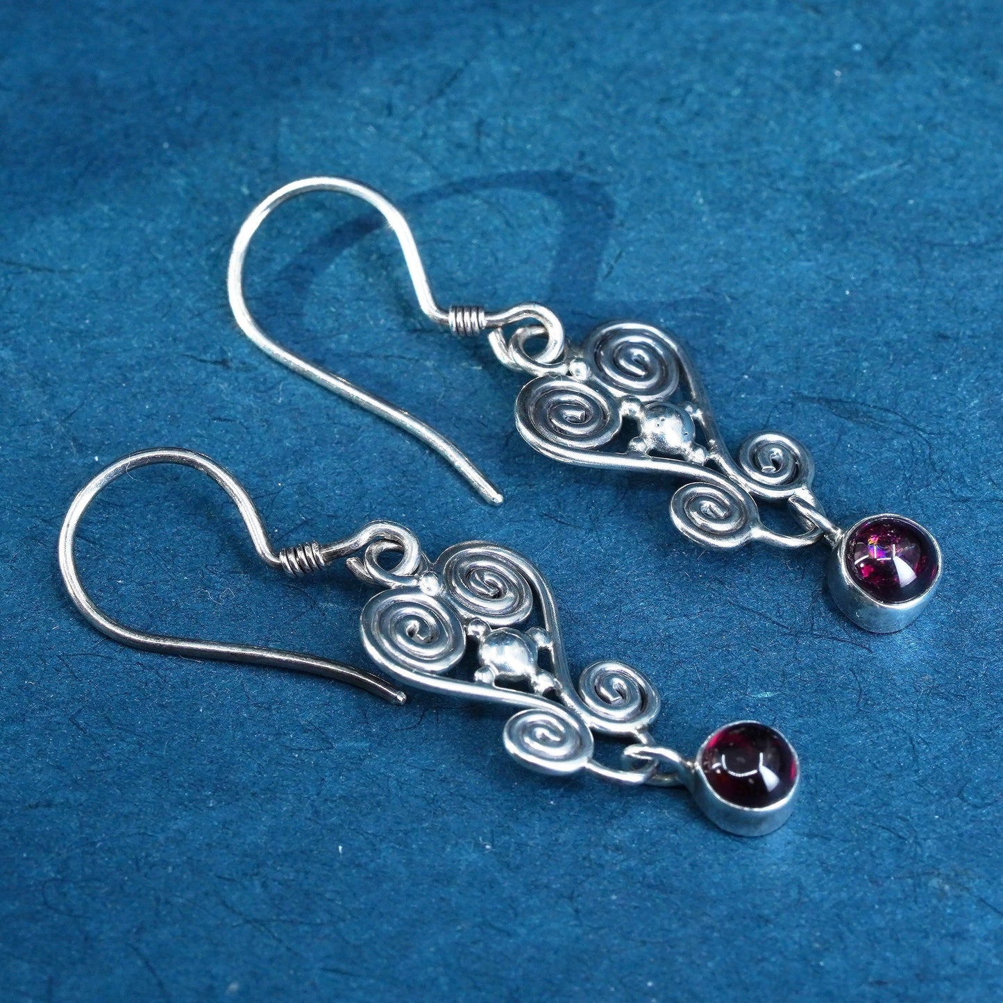 Vintage Sterling Silver handmade Earrings. 925 swirl dangles with garnet