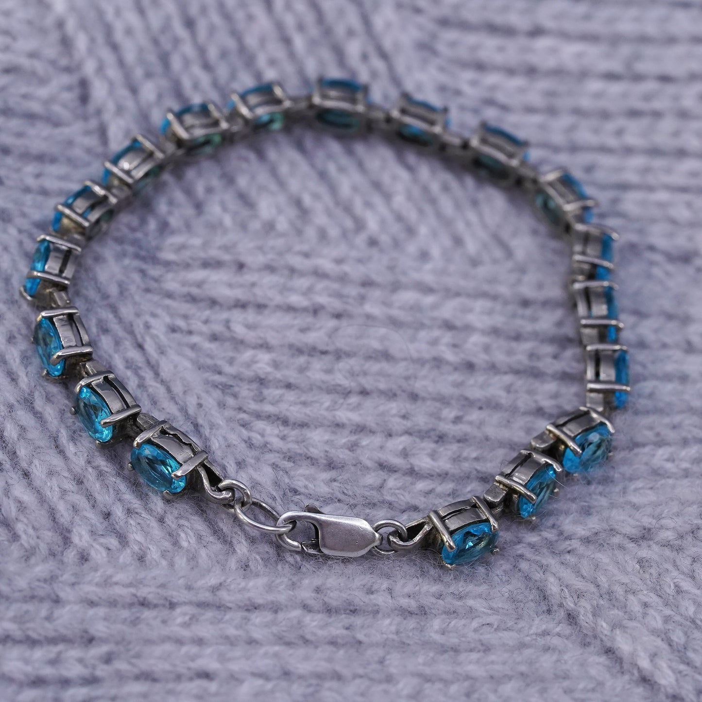 7.5", vintage Sterling 925 silver tennis bracelet with blue topaz