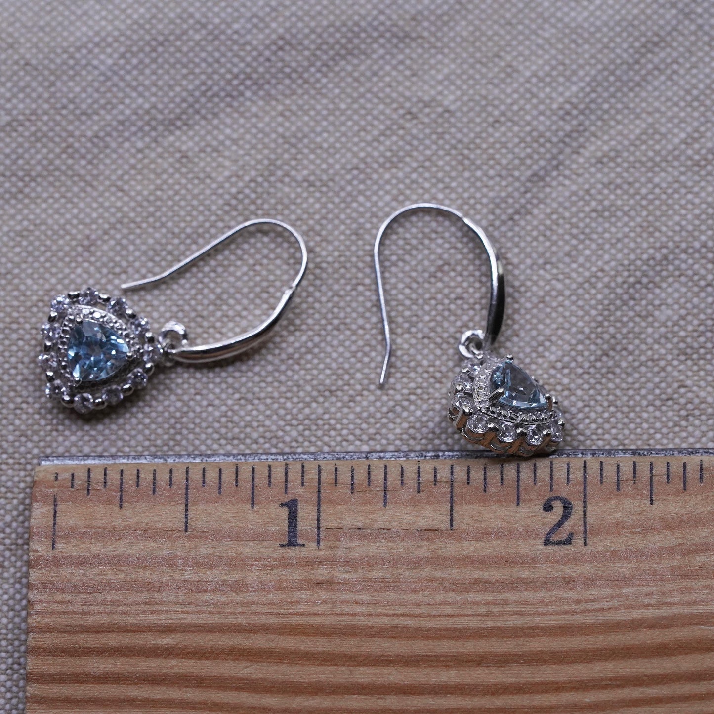 Vintage sterling 925 silver handmade earrings with blue topaz and cz around
