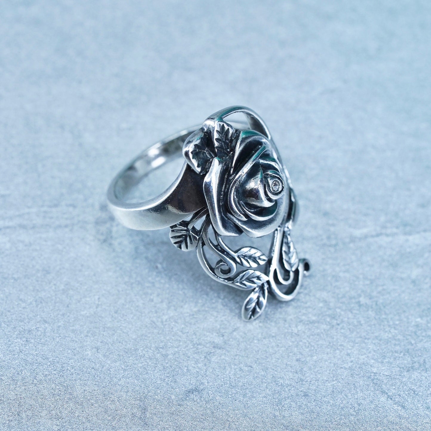 Size 7, vtg southwestern Sterling 925 silver handmade ring, flower band and Cz