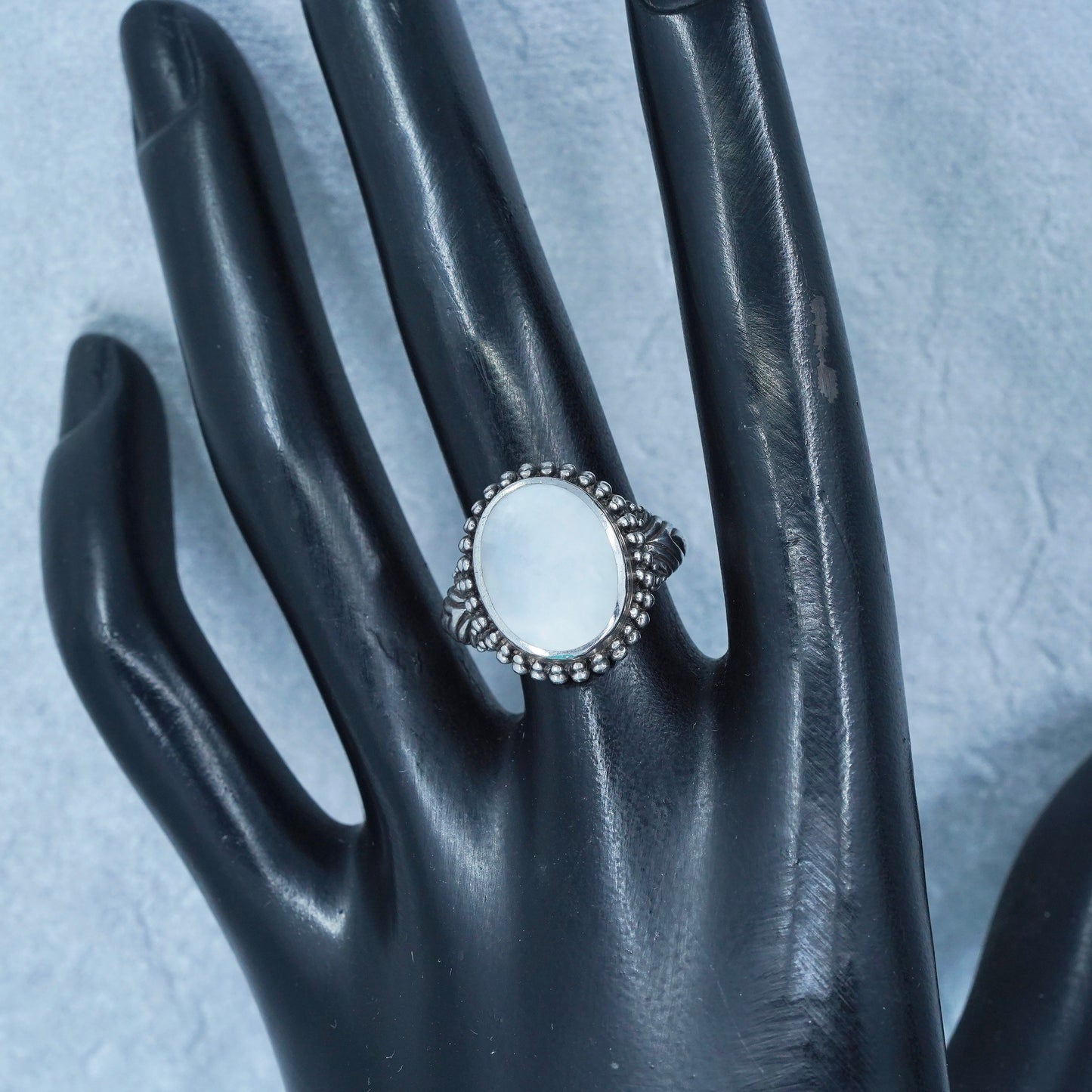 Size 7.5, southwestern Sterling 925 silver ring with mother of pearl and beads