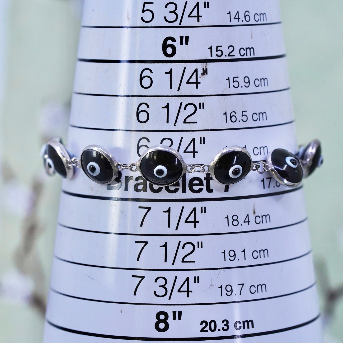 6.75”, vintage handmade sterling silver bracelet, black glass evil eye beads