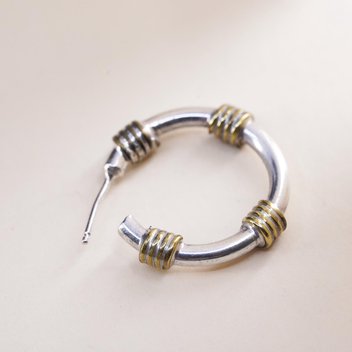 Vintage two tone Mexican single earring. Sterling 925 silver huggie stud