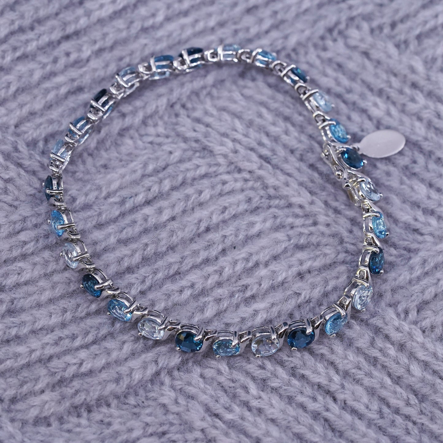 7", vintage Sterling 925 silver tennis bracelet with blue topaz