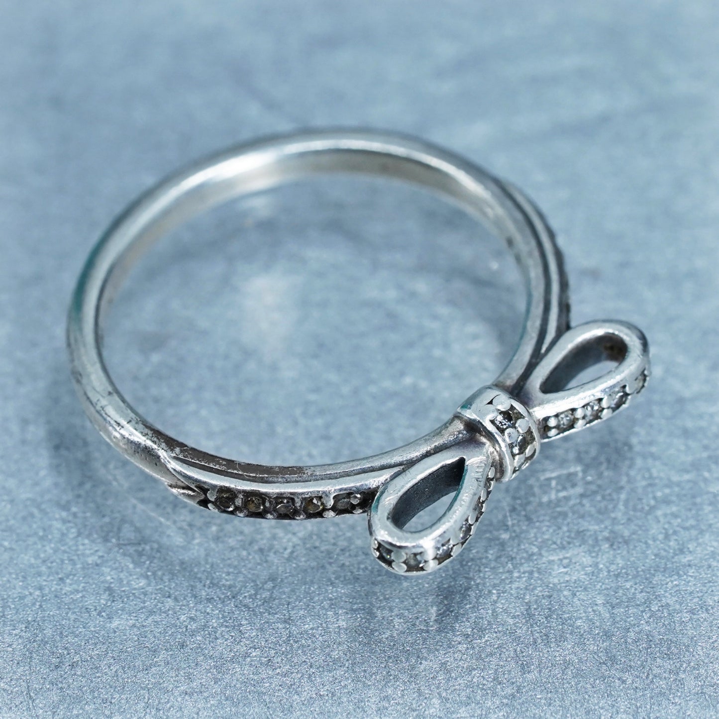 Size 7.25, ALE fashionable Sterling 925 silver ribbon ring w/ cluster cz, band