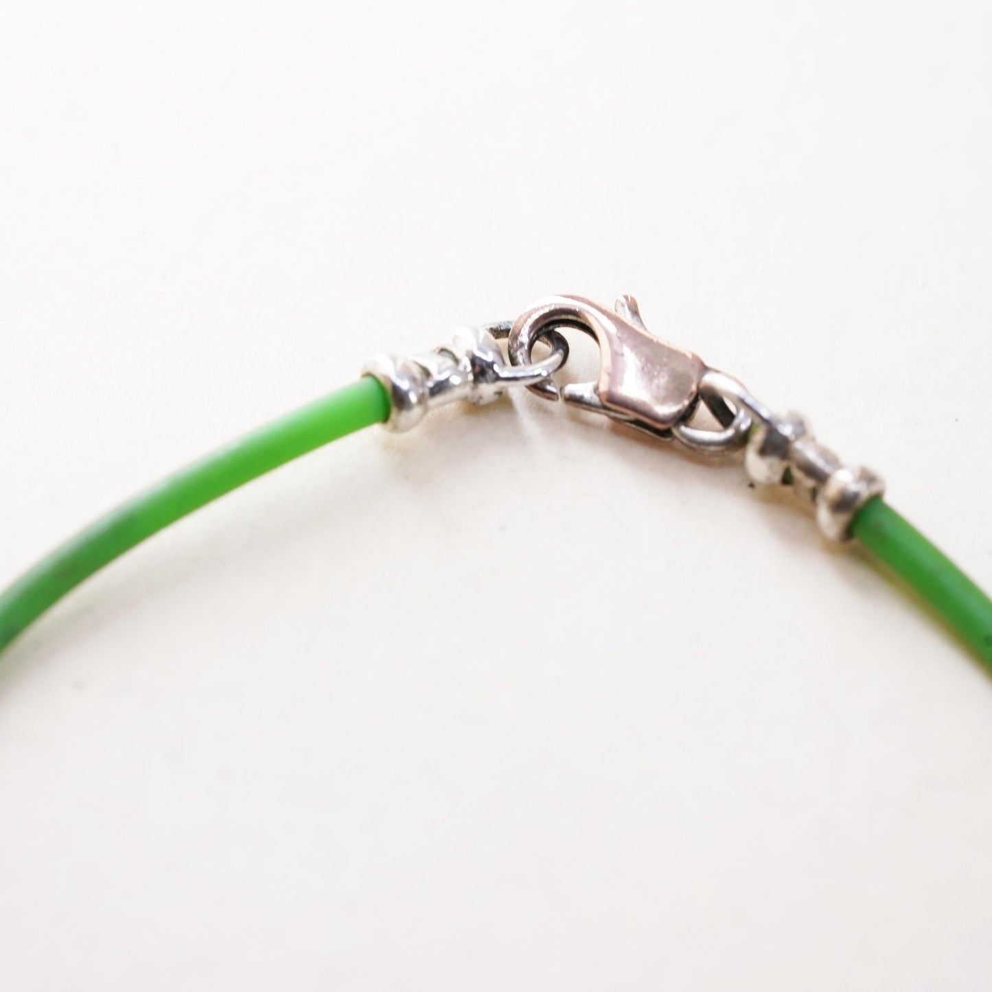 6”, Vintage green rubber band stackable bracelet with silver tone details