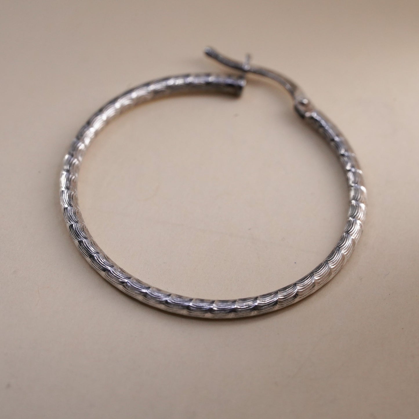 1.25", Vintage sterling silver loop single earring, textured hoop